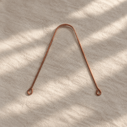 Raspador de lengua de cobre