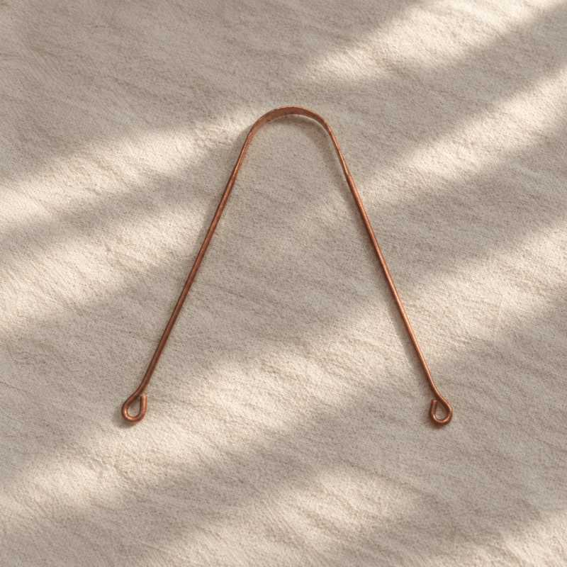 Raspador de lengua de cobre